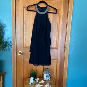 Black formal dress, knee length